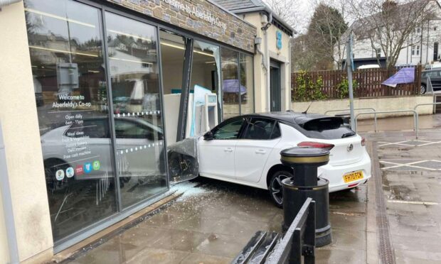 The car crashed into the front of the store. Image: Milu Princes.