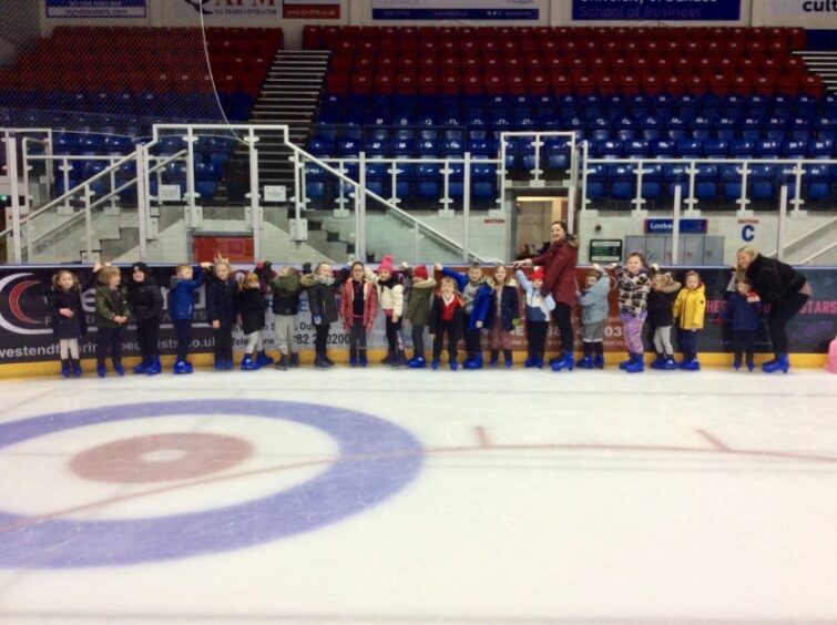 A photo of pupils from Burnside Primary learning to skate at Ice Dundee arena.