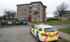 Police on the scene at Tiree Place in Kirkcaldy. Image: David Wardle.