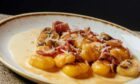 Crispy potato dumplings with smoky bacon. Image: Supplied by Albert Bartlett 