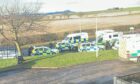Police gathered in Kennoway during the siege in January. Image: Fife Jammer Locations Facebook.