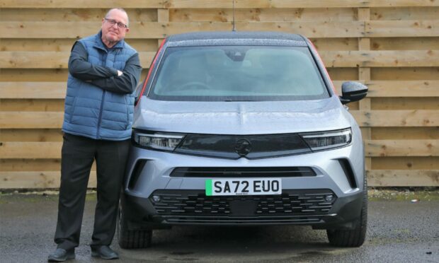 Carnoustie hotel manager Rob Alcock, who isn't happy being stuck with an electric vehicle. Image: Gareth Jennings/DC Thomson
