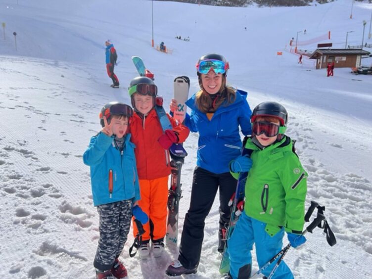 Martel Maxwell on the ski slopes with her three sons.