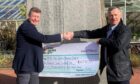 IED Training Solutions MD and former Royal Marines Commando Ian Clark (right) presents the cheque to Danny Egan of RMA - The Royal Marines Charity. Image: IED Training Solutions