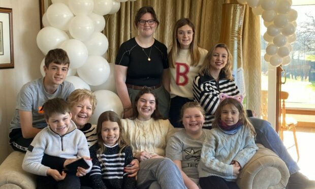 Mary-Jane's aunt Kathleen, with nine of the 15 from the next generation.