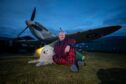Ex-RAF serviceman Davy Brown and dog Ness ready for their Spitfire sleep out at RAF Montrose. Image: Kim Cessford/DC Thomson