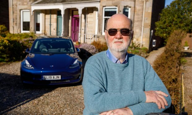 Perth pensioner Mike Perry thinks electric cars are the future. Image: Kenny Smith/DC Thomson
