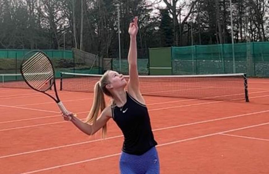 Katie McKay playing tennis