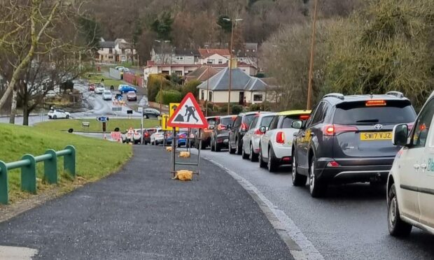 Traffic queueing on Old Glamis Road on the approach to the Trottick circle on Thursday afternoon. Image: Bryan Copland/DC Thomson