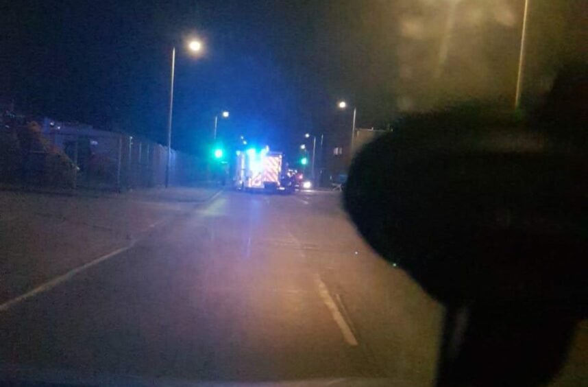 The emergency services at the scene on Milton of Craigie Road North in Dundee. Image: DC Thomson.