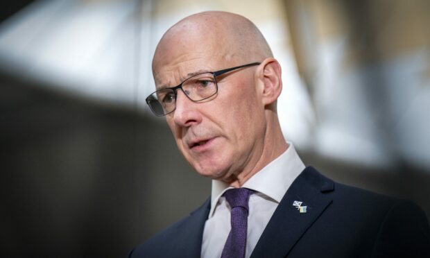John Swinney has been in multiple government roles. Image: PA