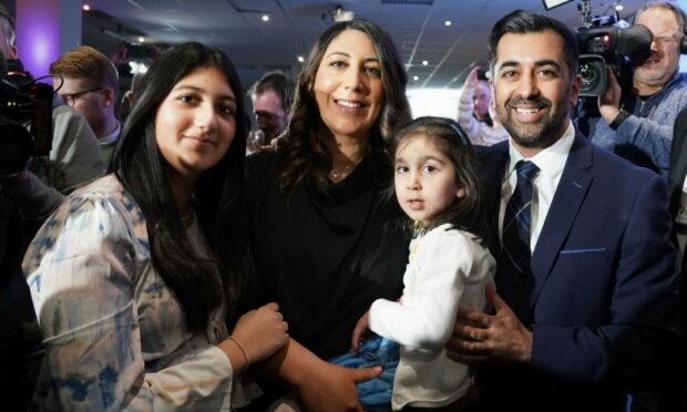 Humza Yousaf with his wife Nadia El Nakla, daughter Amal and step-daughter at Murrayfield Stadium in Edinburgh, after it was announced that he is the new Scottish National Party leader, and will become the next first minister of Scotland.
