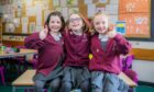 P3 pupils Izzy MacDonald (left), Lily Malkowska (centre) and Chloe Sherrard all received Courier Gold Star Awards. Image: Steve MacDougall/DC Thomson.