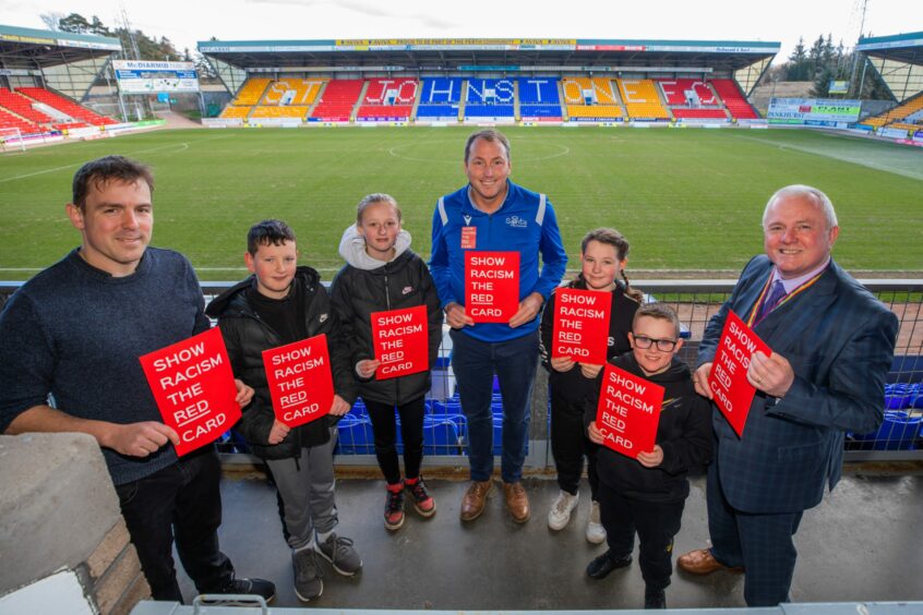 Fran Smith as CEO of Saints in the Community with local children at a Show Racism the Red Card event.