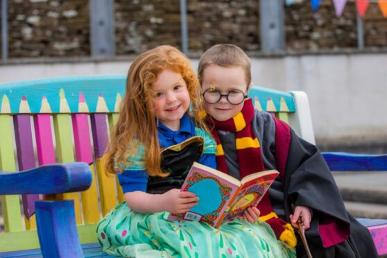 Logan Sinclair and Emily Wilkinson (both primary 1) from The Community School of Auchterarder celebrating World Book Day. Image: Steve MacDougall/DC Thomson