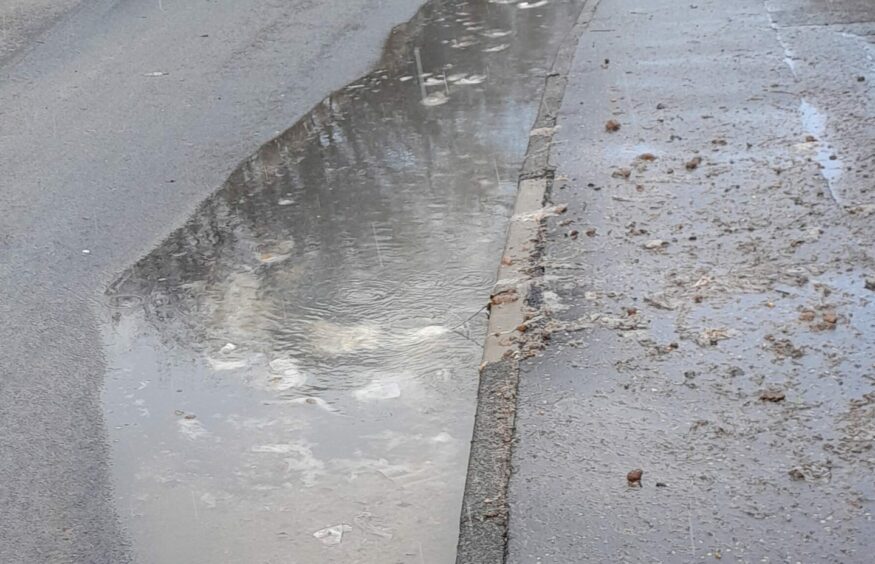 Sewage overflowing from a drain in Aberfeldy. 