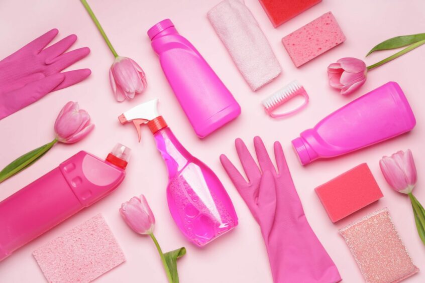 An image of cleaning products laid out. Giving your home a good clean can help make room for some spring decoration ideas!