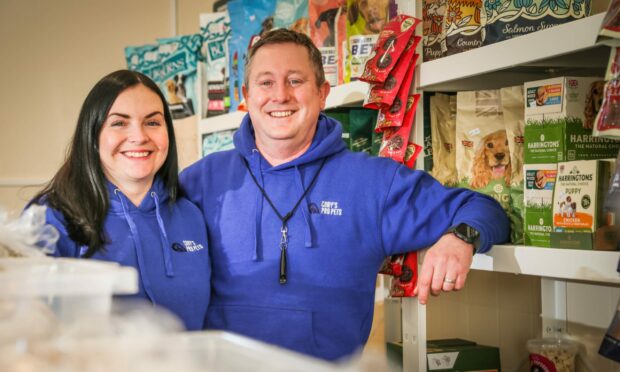 Gary Reekie and wife Llana inside the shop. Image: Mhairi Edwards/DC Thomson.