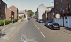 Officers descended on Rosebank Street in the Hilltown area of Dundee on Tuesday morning. Image: Google Maps.