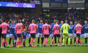Raith Rovers and Rangers players shake hands before their Scottish Cup quarter-final in 2023.