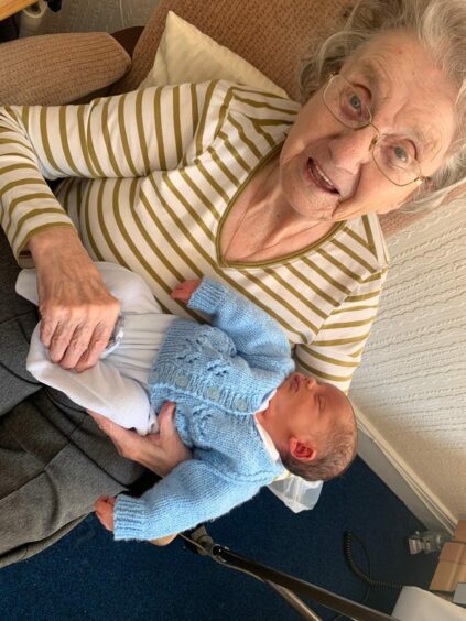 Sadie with baby Owen, her great-great-grandson.