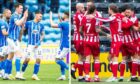 It was a game of two halves for St Johnstone. Images: SNS.