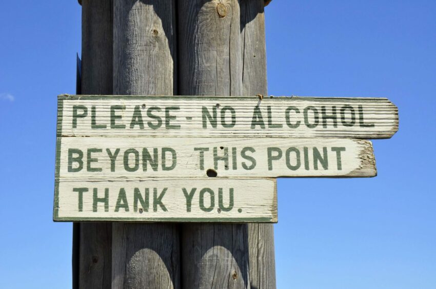 sign reading 'Please - no alcohol beyond this point, thank you'