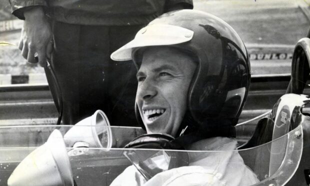Jim Clark pictured at Brands Hatch during practice for the Rac British And European Grand Prix in the 1960s. Image: Shutterstock