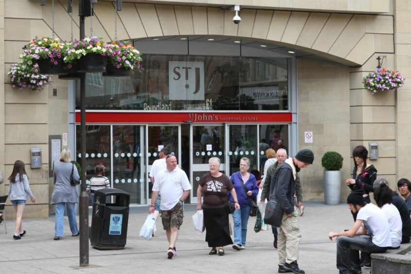 Perth's St John's shopping centre exterior with shoppers milling around outside