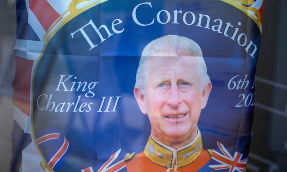 A poster promoting the King's coronation.