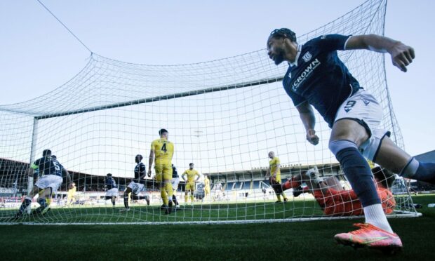 Kwame Thomas celebrates after scoring for Dundee in the draw with Morton. Image: David Young / Shutterstock.