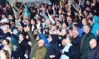 Dundee fans celebrate Lyall Cameron's goal at Cove Rangers. Image: David Young/Shutterstock.