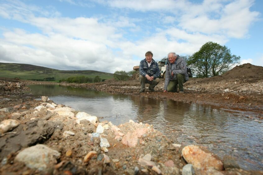 Tom Sampson and Dr Marshall Halliday of the Esk Rivers Trust on the bank of the newly-restored Rottal Burn back in 2012. 