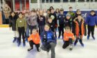 A photo of schoolpupils learning to skate thanks to Ice Dundee