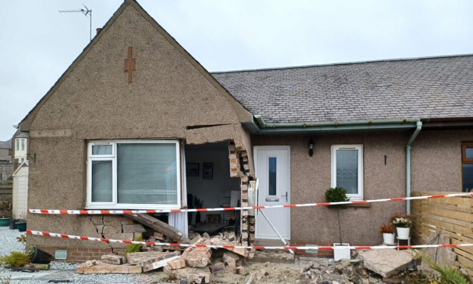 A huge hole has been left in the front of the Carnoustie house.
