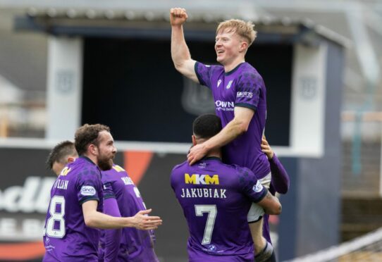 Lyall Cameron celebrates his hat-trick goal as Dundee hammered Hamilton. Image: SNS.