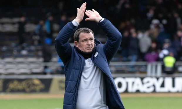 Dundee boss Gary Bowyer applauds the Dens Park crowd. Image: SNS.