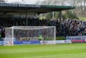 Over 3,000 Dundee fans packed the away end at Gayfield. Image: SNS.