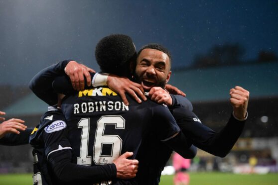 Dundee celebrate Zach Robinson's opening goal against Raith Rovers. Image: SNS.