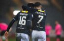 Dundee goalscorers Zach Robinson and Alex Jakubiak celebrate against Raith Rovers. Image: SNS.