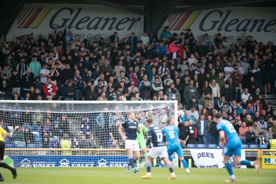 Dundee fans in the away end at Inverness last month. Image: SNS.