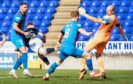 Lyall Cameron puts Dundee in front at Inverness with an improvised back heel. Image: SNS.