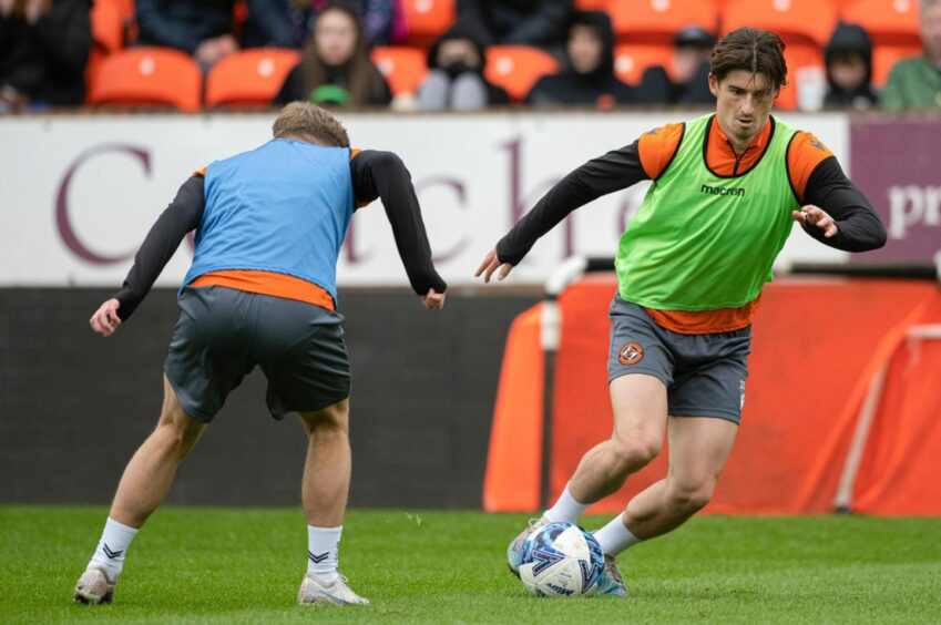Ian Harkes takes on his team-mate during open training.