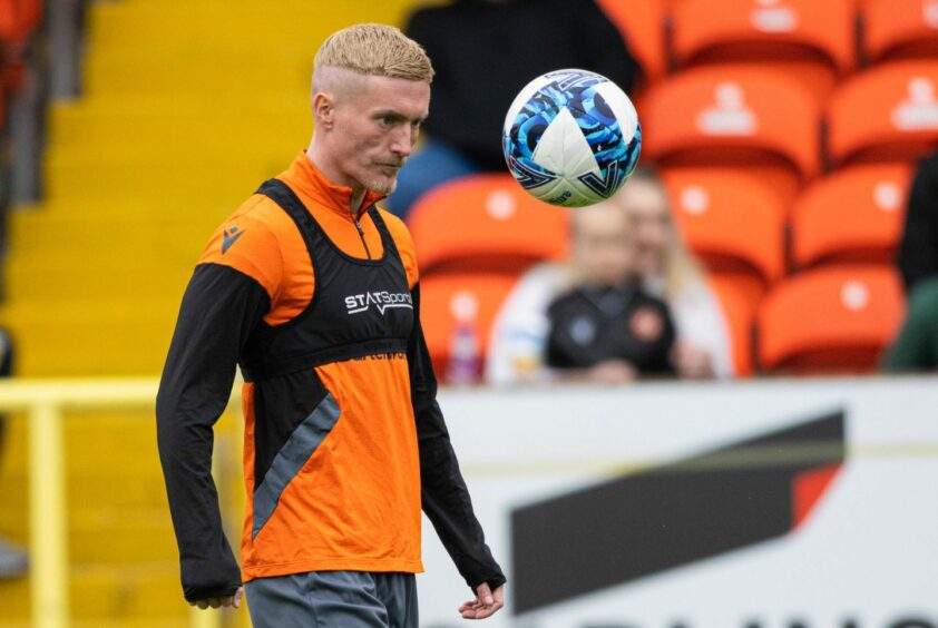 Craig Sibbald focused on the ball during training.