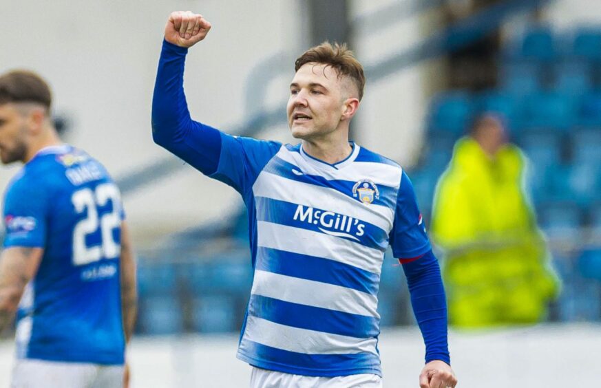 Grant Gillespie celebrates after scoring his penalty against Queen's Park. Image: SNS.