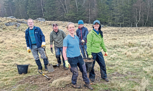 Gayle joins volunteers  led by Shona Irvine to help fix the footpath leading to Loch Brandy.
