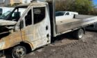 The burnt out flatbed lorry belonging to Gowrie Contracts. Image: Gowrie Contracts.