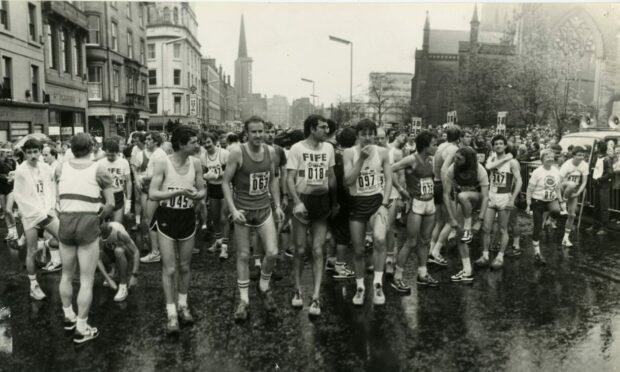 Runners gather together in the city centre at the starting point of the Dundee Marathon.