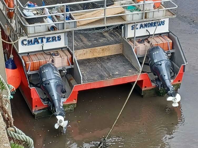 A twin engine boat at St Andrews Harbour