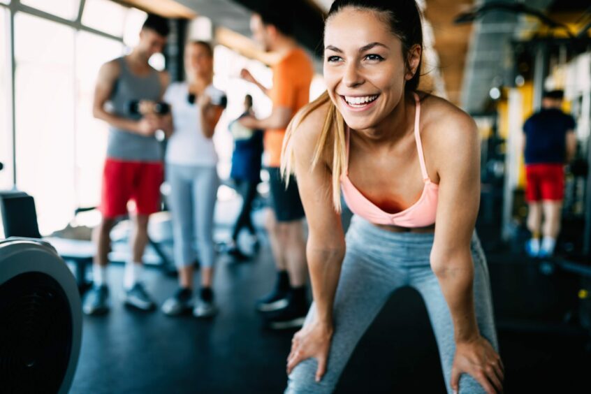 Woman working out in gym.